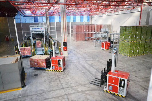 LASER GUIDED VEHICLES AND AUTOMATIC MANAGEMENT OF THE PRODUCTION PROCESS | © OCME